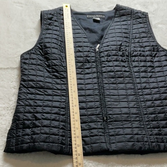 Black Puffer Vest with Horizontal Quilting and Zip Closure - Picture 2 of 5
